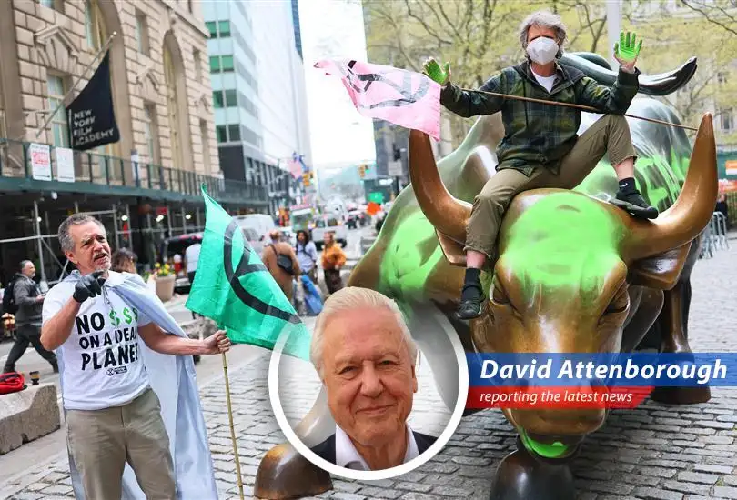 Environmental activists vandalize Wall Street's Charging Bull statue with neon green paint on Earth Day, protesting corporate greed.