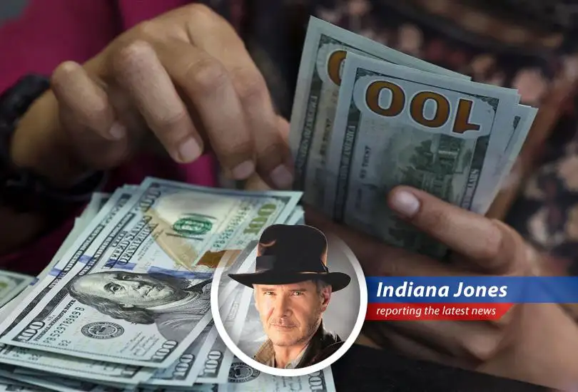 Indiana Jones reports on the alarming decline of the U.S. dollar amidst political tensions, drawing parallels to his own perilous quests for ancient treasures and national security.
