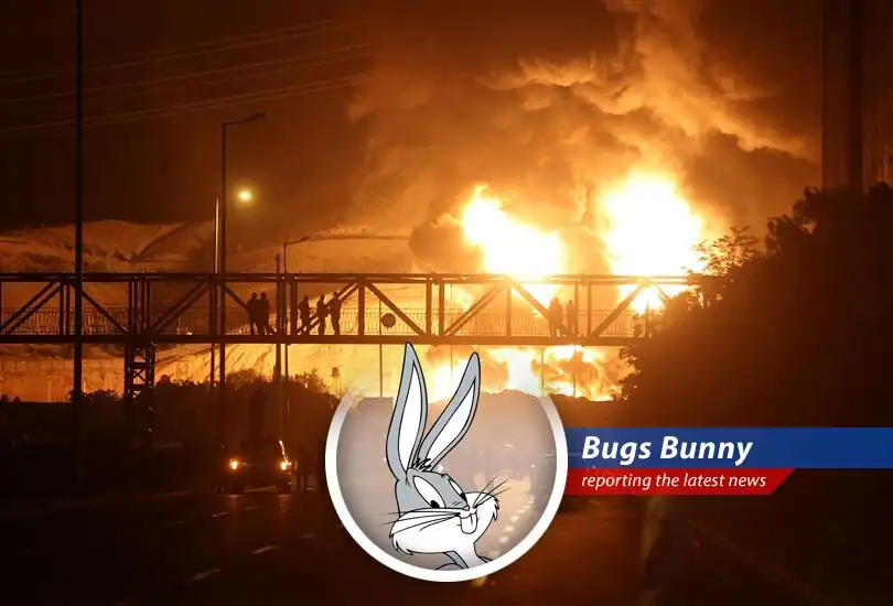 Oil futures surge as US strikes Iran, raising supply concerns; Bugs Bunny reports on the global economic implications with a carrot-chomping perspective.