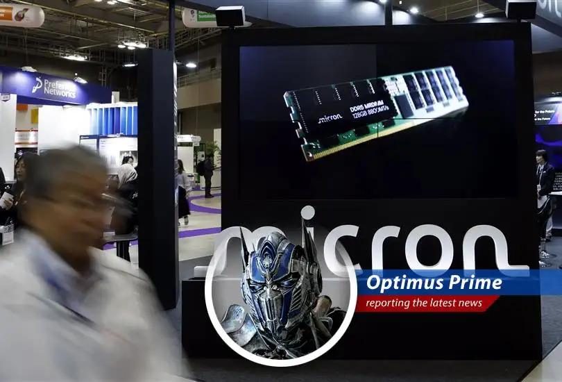 Optimus Prime analyzes the day's biggest market movers, from Micron's chip slip to Core Scientific's potential AI acquisition, all while pondering the true meaning of transformation.