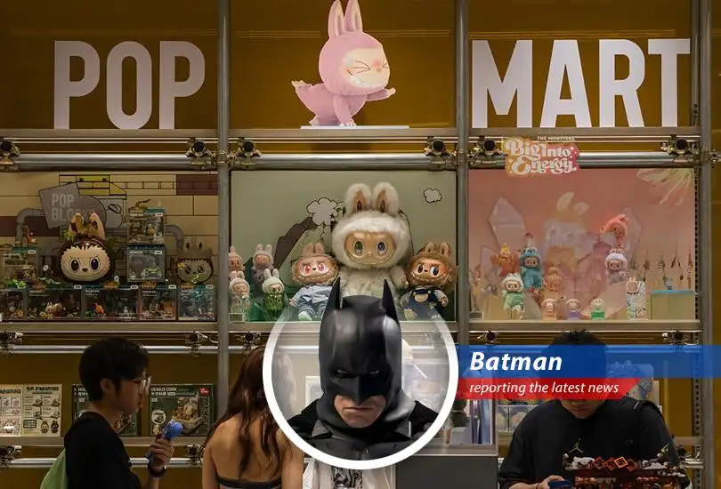 Shares of Chinese toy giant Pop Mart are experiencing a downturn after a period of rapid growth, raising questions about the sustainability of the 'blind box' craze. Even Batman thinks the valuation is a little crazy!