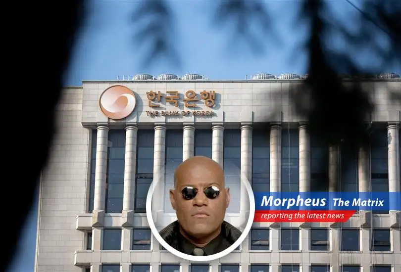 South Korea's central bank lowers interest rates amidst political turmoil and Trump-era tariffs, hoping to stimulate a sluggish economy. But is this reality, or just another layer of the Matrix?