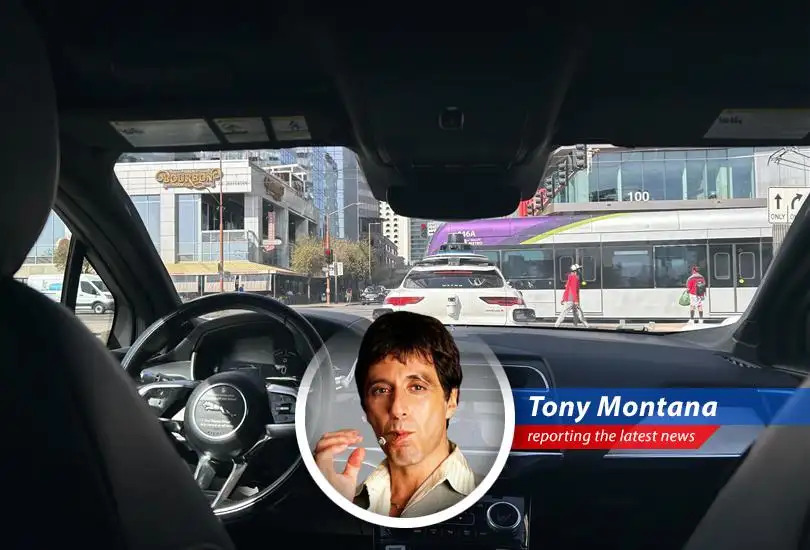 Tony Montana reports on Waymo's expansion, comparing their robotaxi ambitions to his own empire-building, with a healthy dose of sarcasm and '80s movie references.