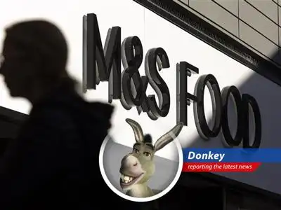 A cyberattack is set to munch away almost a third of M&S's annual profits, leaving their shelves emptier than my tummy after a long flight! image