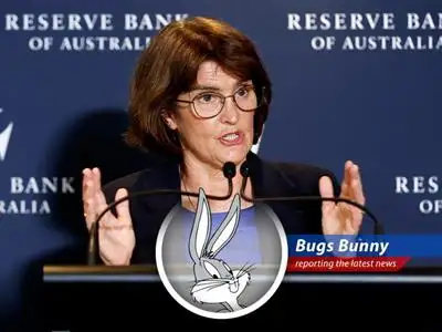 Australia's central bank cuts interest rates amidst inflation concerns, leaving this bunny wondering what it all means for his carrot crop! image