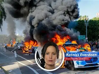 Autonomous vehicles go up in flames amidst protests against immigration policies, raising questions about safety and the future of robotaxis. image