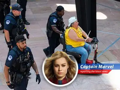 Captain Marvel reports on the U.S. Capitol Police arresting protesters demonstrating against proposed Medicaid cuts in Trump's budget. Looks like Earth needs a little help from its friendly neighborhood space-faring hero, again! image