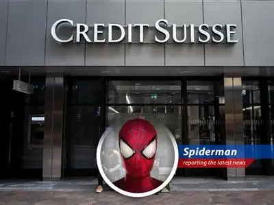 Credit Suisse coughs up $511 million for helping rich folks hide billions from Uncle Sam. UBS steps in, hoping to clean up the mess before it sticks to their webs. image