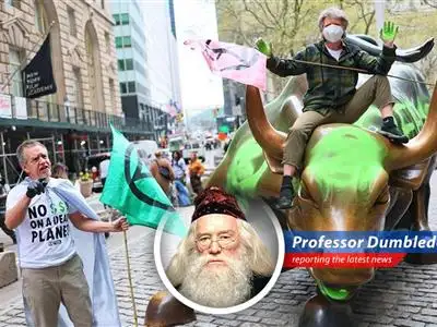 Environmental activists paint Wall Street's Charging Bull green on Earth Day, sparking debate and a quick cleanup. image