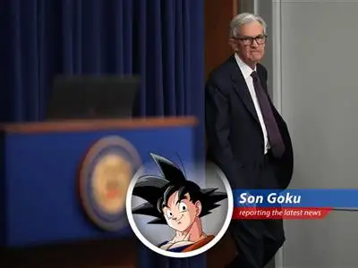 Goku reports on the Federal Reserve's cautious approach as they await the outcome of US trade deals, leaving everyone in suspense, just like waiting for a Spirit Bomb to charge! image