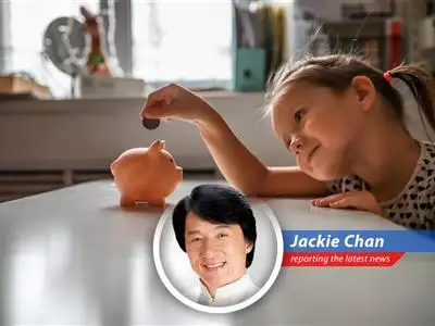 Jackie Chan dives into Germany's new plan to give kids as young as six an early start on their retirement savings, pondering if it's a stroke of genius or just a lot of 'splish splash' with government money. image
