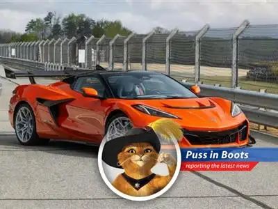 Puss in Boots reports on General Motors unleashing a hybrid 'hypercar' Corvette, leaving supercars in the dust with its blistering speed and electrification. image