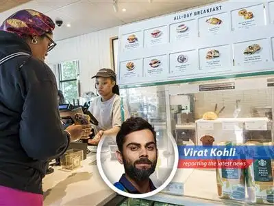 Virat Kohli analyzes Starbucks' recent earnings dip, highlighting the challenges of turnarounds, potential for growth, and why a little 'Virat' energy could be just what they need. image