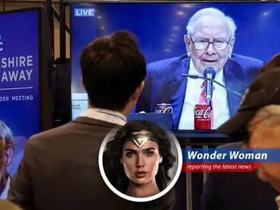 Warren Buffett announces his successor, Greg Abel, causing a temporary dip in Berkshire Hathaway shares, but analysts remain optimistic about the future. image