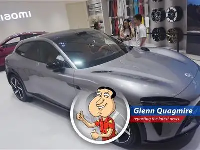 Xiaomi's stock skyrockets after unveiling a Tesla-rivaling electric SUV, packed with AI features and a price tag that's got Elon sweating like Peter Griffin at a buffet. image